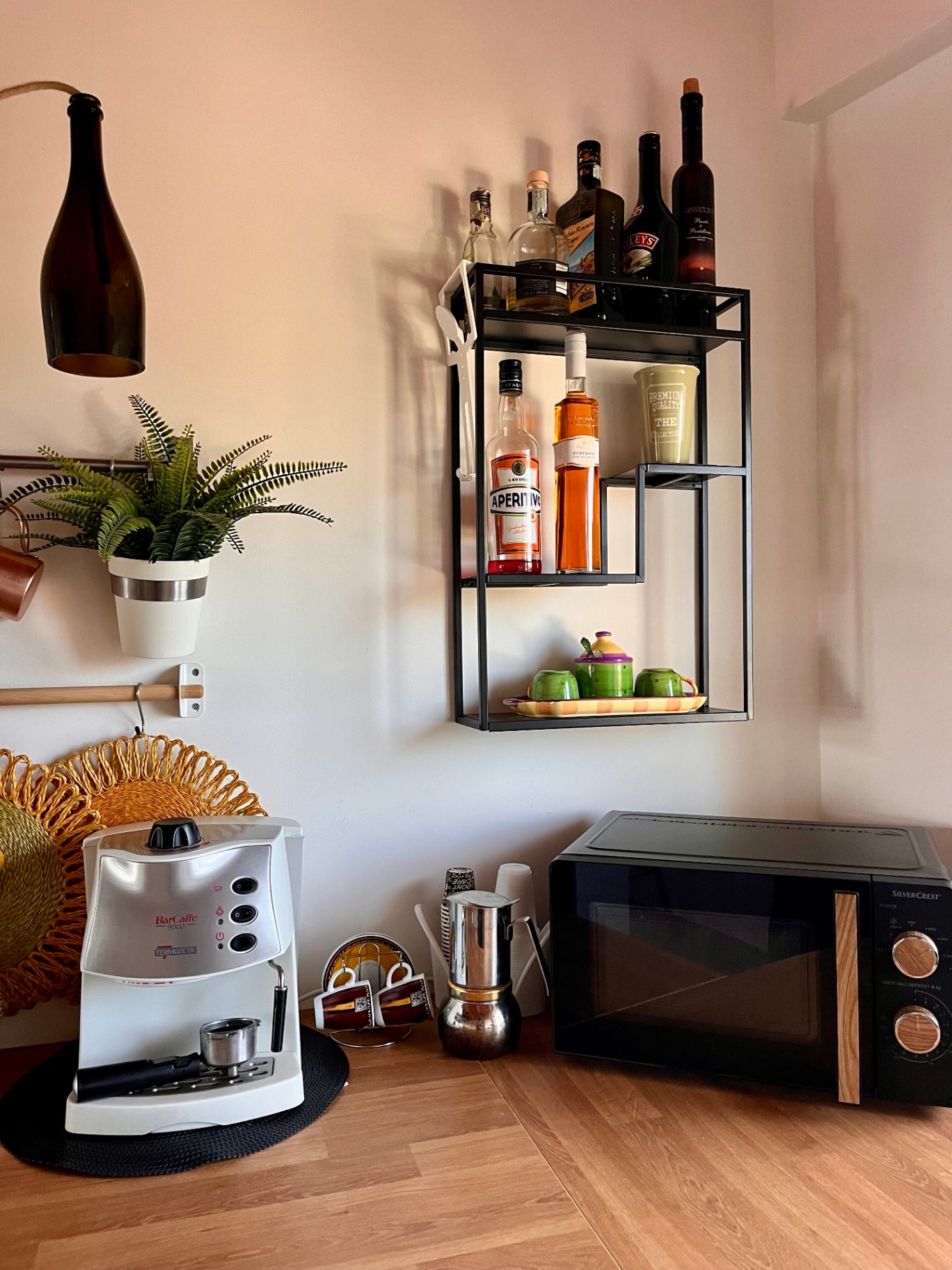 Open kitchen and living space at The Blue Window sea-view apartment, South-East Sicily